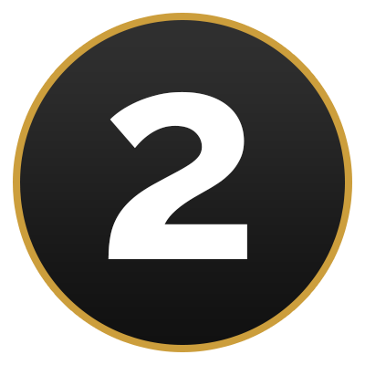 The number two in a gold circle on a black background.