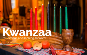 The word kwanzaa is written on a table.