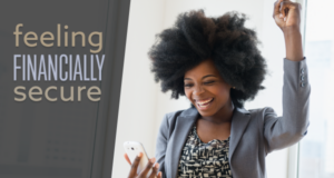 A woman holding up a cell phone with the words feeling financially secure.