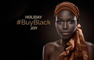 A woman wearing a turban with the words holiday buy black joy.