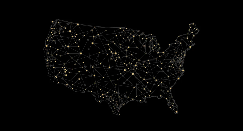 Map of the United States with interconnected glowing nodes and lines on a black background, representing a network.